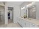 Modern bathroom featuring double vanity, quartz countertops, and glass enclosed shower at 4532 Stellata Loop, Sherrills Ford, NC 28673
