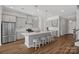 Modern kitchen with an island, stainless steel appliances, white cabinets, and a sleek countertop at 4532 Stellata Loop, Sherrills Ford, NC 28673