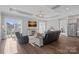 Bright living room features modern recessed lighting, ceiling fan, and wood flooring at 4532 Stellata Loop, Sherrills Ford, NC 28673