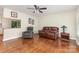 Sun-filled living room with hardwood floors, neutral paint, and comfortable seating at 4915 Galax Dr, Charlotte, NC 28213