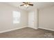 Bright, inviting bedroom featuring plush carpeting, ample light, and a serene atmosphere at 507 E Cloninger St, Dallas, NC 28034