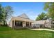Beautifully designed home with a classic front porch and manicured lawn at 507 E Cloninger St, Dallas, NC 28034