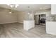 Modern kitchen featuring stainless steel appliances, granite countertops, and an island at 507 E Cloninger St, Dallas, NC 28034