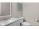 The bathroom features a modern sink and toilet with a decorative piece on the wall at 507 Galesburg Dr, Monroe, NC 28110