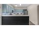 This kitchen features blue cabinets, stainless steel appliances and light countertops at 507 Galesburg Dr, Monroe, NC 28110