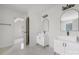 Bright bathroom featuring double vanity sinks, modern fixtures, and tile flooring at 6504 Sybil Ct, Indian Trail, NC 28079
