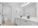 Bathroom featuring double vanity, modern fixtures, and a well-lit mirror at 6504 Sybil Ct, Indian Trail, NC 28079