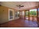 Covered patio for outdoor entertaining and relaxation with views of the surrounding backyard and greenery at 6504 Sybil Ct, Indian Trail, NC 28079