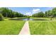 Scenic view of a community pond surrounded by lush greenery at 6504 Sybil Ct, Indian Trail, NC 28079