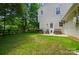 This home features a spacious backyard, patio, and grill, perfect for outdoor entertaining and relaxation at 8014 Sherington Way, Charlotte, NC 28227