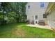 This home features a spacious backyard, patio, and grill, perfect for outdoor entertaining and relaxation at 8014 Sherington Way, Charlotte, NC 28227