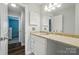 Bright bathroom with granite vanity, storage and an adjacent room at 8014 Sherington Way, Charlotte, NC 28227