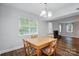 Bright dining area with a view of the backyard at 8014 Sherington Way, Charlotte, NC 28227