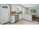 Kitchen featuring stainless appliances and granite countertops at 8014 Sherington Way, Charlotte, NC 28227