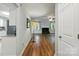 Inviting living room features hardwood floors and a cozy fireplace at 8014 Sherington Way, Charlotte, NC 28227