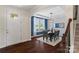 Elegant dining room with hardwood floors, modern light fixture, and stylish decor, perfect for Gathering gatherings at 837 Tyne Dr, Fort Mill, SC 29715