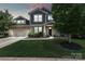Charming two-story home with a brick facade, lush lawn, mature tree, and a two car garage at 837 Tyne Dr, Fort Mill, SC 29715
