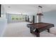 Bright game room with pool table, neutral paint, large windows, and plush carpet at 837 Tyne Dr, Fort Mill, SC 29715