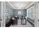 Well-lit office space with modern decor, large window, and stylish furnishings at 837 Tyne Dr, Fort Mill, SC 29715