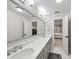 Bathroom with double vanity, granite counters, and plenty of storage at 8527 Foxbridge Dr, Matthews, NC 28104