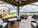 Inviting covered patio with comfortable seating and beautiful waterfront views at 930 Jetton St, Davidson, NC 28036