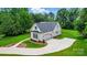 Beautiful home with an attached garage, a spacious driveway, and manicured landscaping at 9311 Simpson Rd, Waxhaw, NC 28173