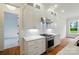 Well-equipped kitchen with stainless gas range, ample cabinetry and marble countertops at 9311 Simpson Rd, Waxhaw, NC 28173