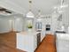 Open kitchen with large island, stainless steel appliances, and abundant cabinetry at 9311 Simpson Rd, Waxhaw, NC 28173