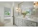 Modern bathroom with double vanity, large mirror, and stylish fixtures at 9315 Simpson Rd, Waxhaw, NC 28173