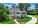 Stunning exterior view of the two-story home showcasing manicured lawn and landscaping at 9315 Simpson Rd, Waxhaw, NC 28173