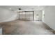 The garage features a clean, spacious interior with ample lighting and a modern door at 9315 Simpson Rd, Waxhaw, NC 28173