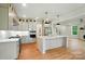 Modern kitchen with stainless steel appliances, island, and plenty of cabinet space at 9315 Simpson Rd, Waxhaw, NC 28173