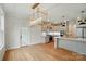 Spacious kitchen with stainless steel appliances, pendant lights, and hardwood floors at 9315 Simpson Rd, Waxhaw, NC 28173
