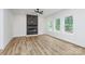 Bright living room with fireplace, hardwood floors, recessed lighting, and natural light from many windows at 1011 Sandy Ct, Gastonia, NC 28056