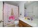bathroom featuring a unicorn-themed shower curtain and decor at 10515 Greenhead View Rd, Charlotte, NC 28262