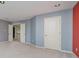 Bonus room with carpet flooring and multiple access doors at 10515 Greenhead View Rd, Charlotte, NC 28262