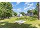A spacious backyard with grass and a view of the back of the house at 1103 Oklahoma St, Kannapolis, NC 28083