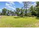 Large, grassy backyard with mature trees at 1103 Oklahoma St, Kannapolis, NC 28083