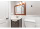 Cozy bathroom with a sink, vanity, mirror, and toilet at 1103 Oklahoma St, Kannapolis, NC 28083