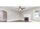 Living room featuring hardwood floors, fireplace, and bright window for plenty of natural light at 1103 Oklahoma St, Kannapolis, NC 28083