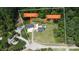 Expansive aerial view of property featuring a home with a pool, a detached garage, and ample land at 1135 Brook Path Trl, Denver, NC 28037