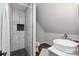 Bathroom featuring a modern tiled shower and vessel sink at 1135 Brook Path Trl, Denver, NC 28037