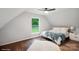 Bright bedroom featuring a ceiling fan, a window, and a bed at 1135 Brook Path Trl, Denver, NC 28037