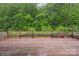 Large wooden deck overlooking lush greenery at 1135 Brook Path Trl, Denver, NC 28037