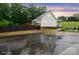 White home features a back deck and a spacious yard with garden at 1135 Brook Path Trl, Denver, NC 28037