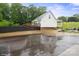Charming home with a welcoming porch, landscaped yard, and exterior deck at 1135 Brook Path Trl, Denver, NC 28037