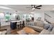 Bright and airy living room connected to a modern kitchen and dining area at 1135 Brook Path Trl, Denver, NC 28037