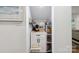 Walk-in pantry featuring custom shelving for optimal storage and organization at 1135 Brook Path Trl, Denver, NC 28037