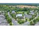 Aerial view of community pool, clubhouse, and surrounding homes showcases the neighborhood's amenities and layout at 11945 Red Rust Ln, Charlotte, NC 28277