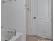 Bathroom featuring soaking tub at 11945 Red Rust Ln, Charlotte, NC 28277